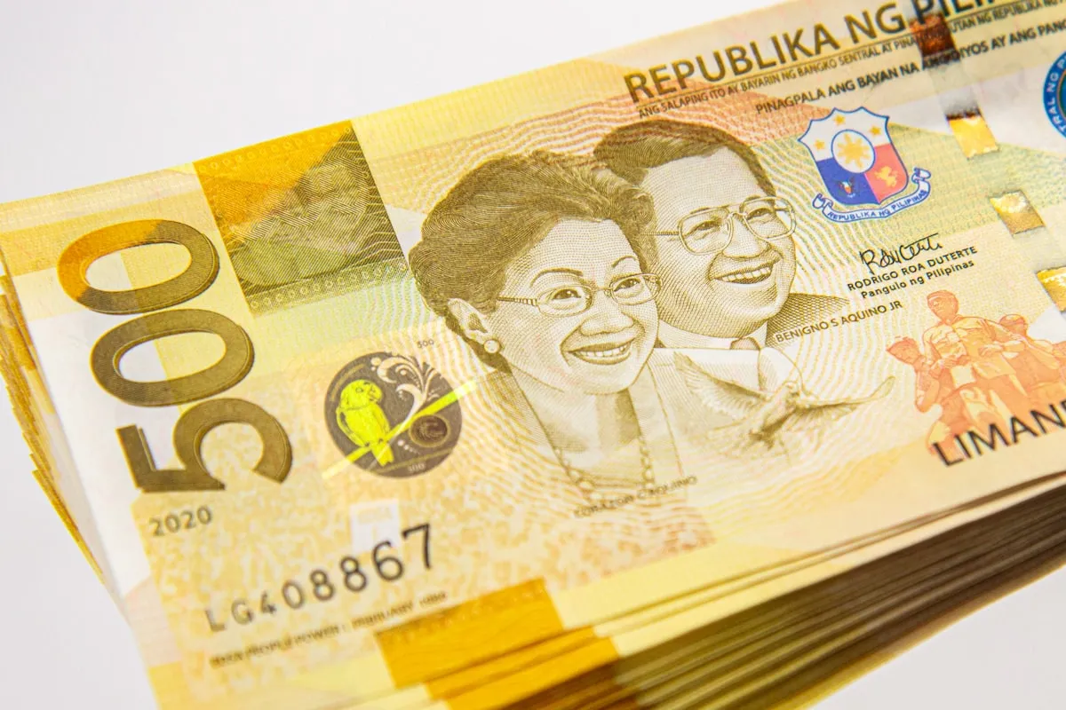 Stack of Philippine ₱500 banknotes representing the budget end of the Davao rental market