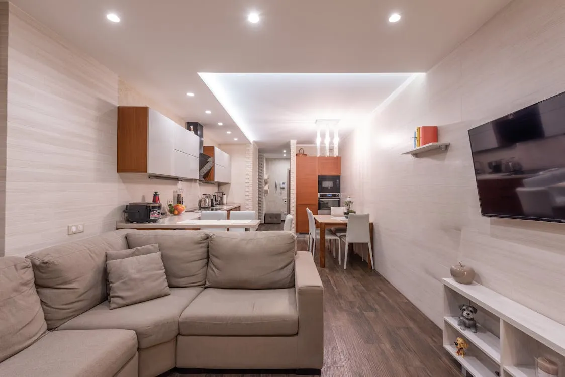 Furnished studio apartment with living area and kitchen