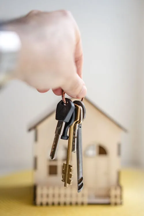 Apartment keys being handed over to a tenant