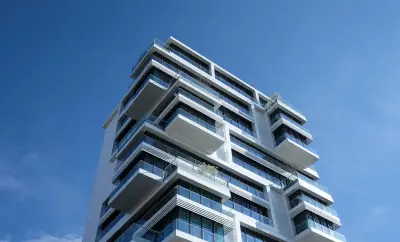 Modern condo building exterior with balconies