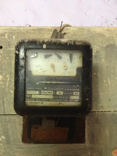 Analog electric meter measuring residential power consumption