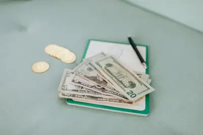 Peso bills representing delayed 13th month or final pay owed to a Davao worker