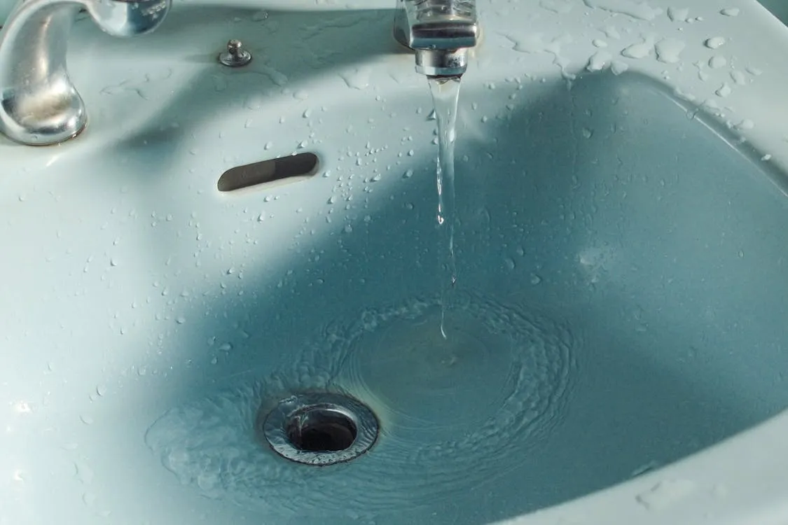 Bathroom sink with running water